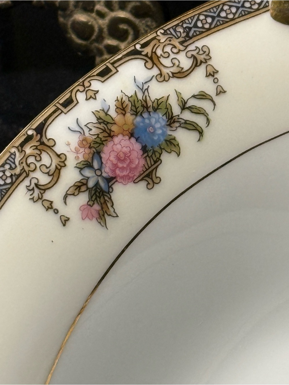 Antique porcelain serving dish with solid gold trim